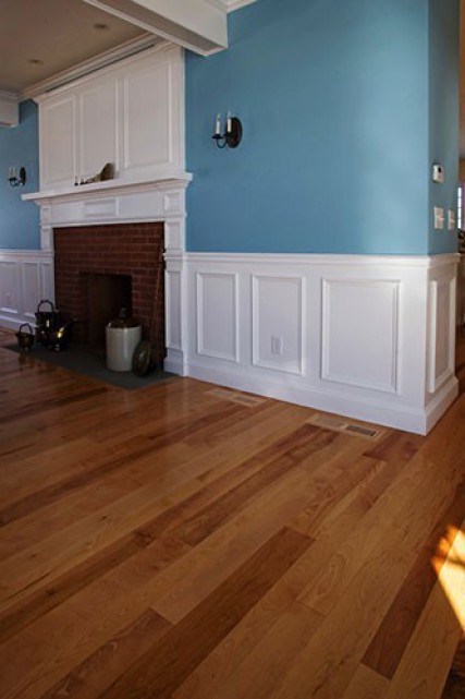 Painted Trim and Mouldings. Birch Floor.